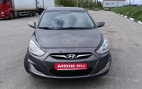 Hyundai Solaris II рестайлинг, 2011 год, 770 000 рублей, 15 фотография