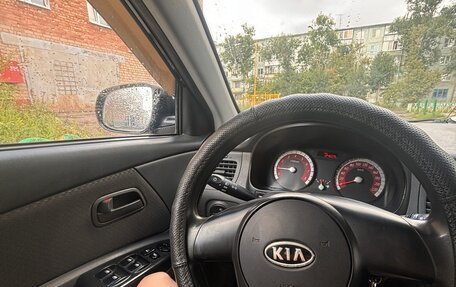 KIA Rio II, 2011 год, 585 000 рублей, 11 фотография