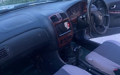 Mazda Familia, 1999 год, 330 000 рублей, 10 фотография