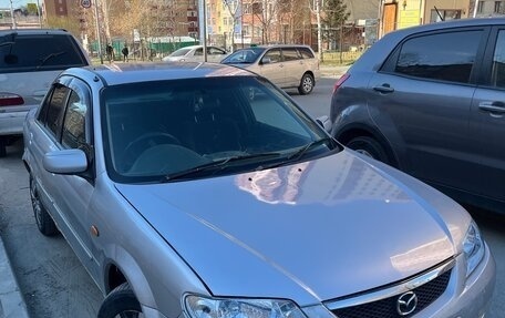 Mazda Familia, 1999 год, 330 000 рублей, 6 фотография