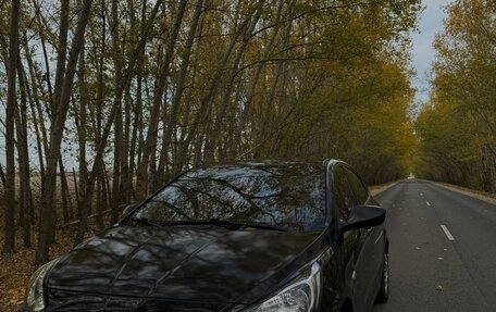 Hyundai Solaris II рестайлинг, 2011 год, 650 000 рублей, 2 фотография
