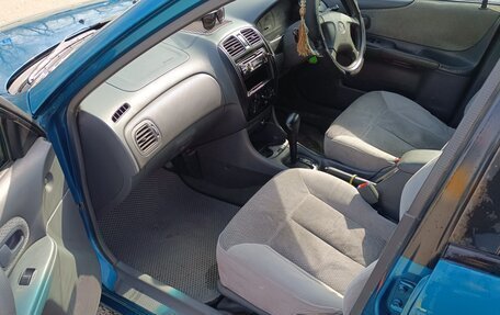 Mazda Familia, 1999 год, 310 000 рублей, 8 фотография