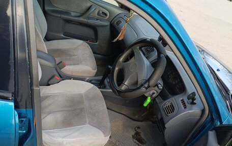 Mazda Familia, 1999 год, 310 000 рублей, 11 фотография