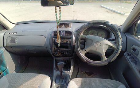 Mazda Familia, 1999 год, 310 000 рублей, 9 фотография