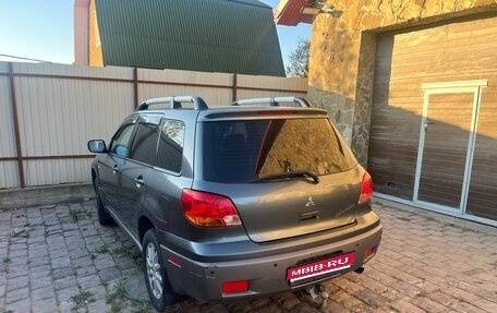 Mitsubishi Outlander III рестайлинг 3, 2003 год, 590 000 рублей, 1 фотография