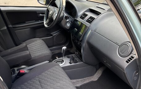 Suzuki SX4 II рестайлинг, 2009 год, 950 000 рублей, 23 фотография
