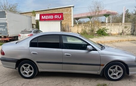 Toyota Avensis III рестайлинг, 2002 год, 449 000 рублей, 4 фотография