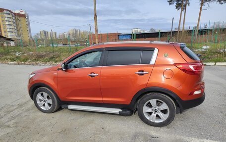 KIA Sportage III, 2011 год, 1 100 000 рублей, 14 фотография