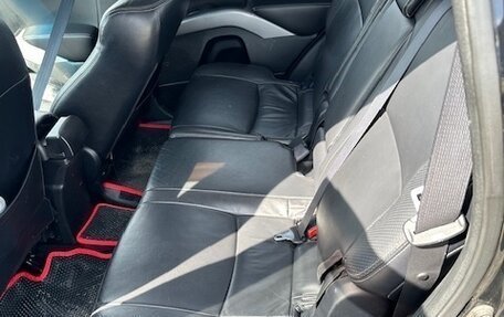 Mitsubishi Outlander III рестайлинг 3, 2011 год, 1 350 000 рублей, 10 фотография