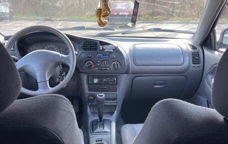 Mitsubishi Colt VI рестайлинг, 1999 год, 230 000 рублей, 12 фотография
