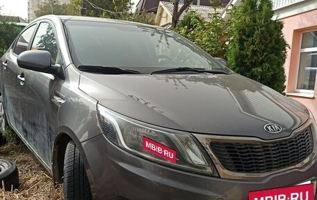 KIA Rio III рестайлинг, 2012 год, 990 000 рублей, 10 фотография
