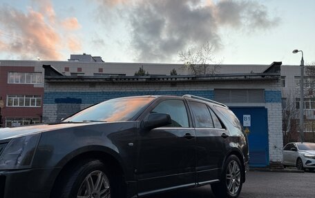 Cadillac SRX II рестайлинг, 2007 год, 650 000 рублей, 3 фотография