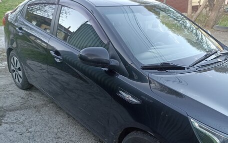 KIA Rio III рестайлинг, 2012 год, 750 000 рублей, 4 фотография