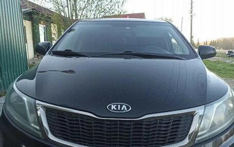 KIA Rio III рестайлинг, 2012 год, 750 000 рублей, 10 фотография