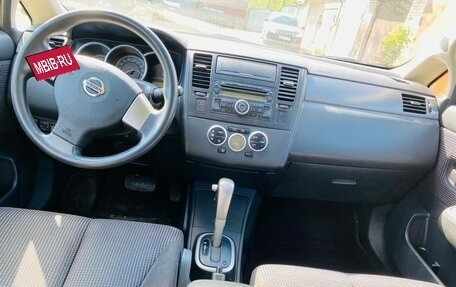 Nissan Tiida, 2010 год, 670 000 рублей, 9 фотография