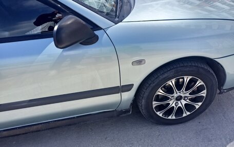 Mitsubishi Carisma I, 2003 год, 350 000 рублей, 13 фотография