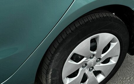 KIA Rio III рестайлинг, 2011 год, 695 000 рублей, 11 фотография