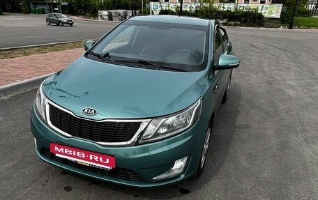 KIA Rio III рестайлинг, 2011 год, 695 000 рублей, 15 фотография