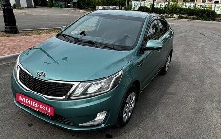 KIA Rio III рестайлинг, 2011 год, 695 000 рублей, 18 фотография