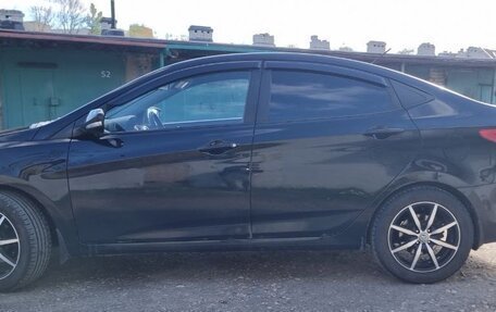 Hyundai Solaris II рестайлинг, 2011 год, 900 000 рублей, 2 фотография