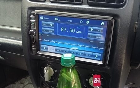 Nissan Cube II, 2000 год, 340 000 рублей, 20 фотография