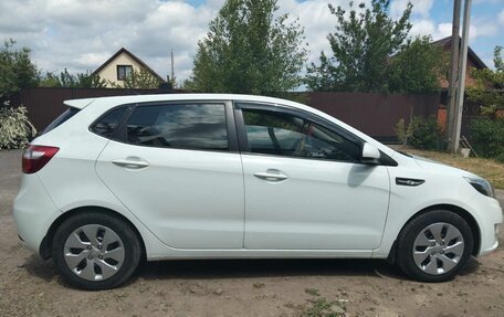 KIA Rio III рестайлинг, 2013 год, 750 000 рублей, 3 фотография