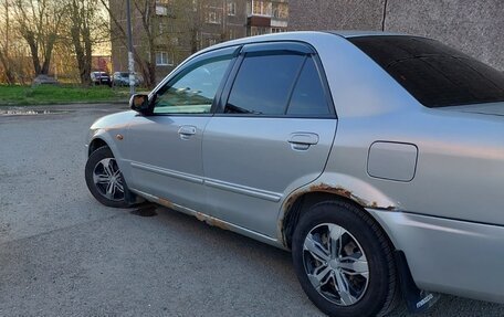 Mazda Familia, 2002 год, 310 000 рублей, 3 фотография