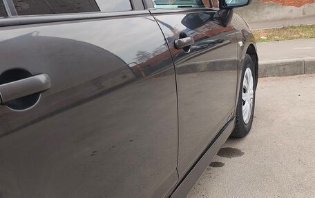 Nissan Tiida, 2010 год, 665 000 рублей, 5 фотография