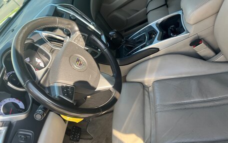 Cadillac SRX II рестайлинг, 2010 год, 1 400 000 рублей, 28 фотография