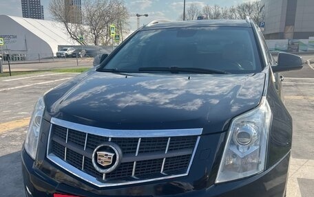 Cadillac SRX II рестайлинг, 2010 год, 1 400 000 рублей, 29 фотография