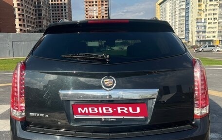Cadillac SRX II рестайлинг, 2010 год, 1 400 000 рублей, 32 фотография