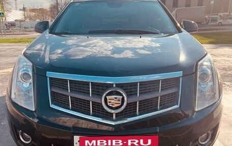 Cadillac SRX II рестайлинг, 2010 год, 1 400 000 рублей, 34 фотография