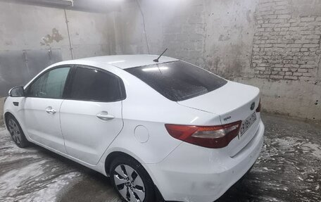 KIA Rio III рестайлинг, 2012 год, 690 000 рублей, 18 фотография