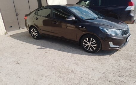 KIA Rio III рестайлинг, 2014 год, 930 000 рублей, 17 фотография