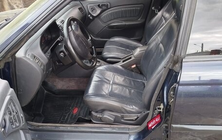 Subaru Outback IV рестайлинг, 1996 год, 410 000 рублей, 8 фотография