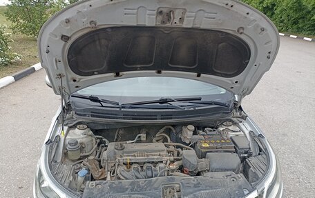 KIA Rio III рестайлинг, 2013 год, 1 050 000 рублей, 18 фотография