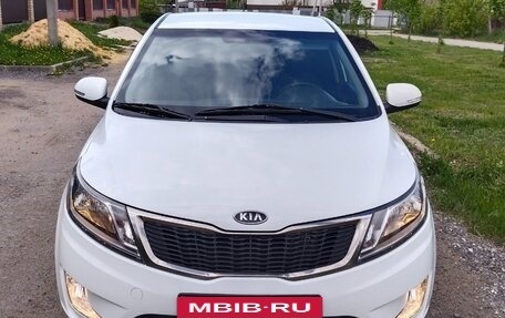 KIA Rio III рестайлинг, 2012 год, 970 000 рублей, 3 фотография