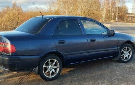 Mitsubishi Carisma I, 2002 год, 140 000 рублей, 4 фотография