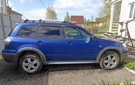 Mitsubishi Outlander III рестайлинг 3, 2004 год, 1 500 000 рублей, 2 фотография