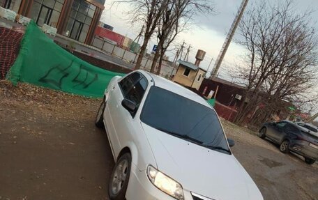Mazda Familia, 1998 год, 160 000 рублей, 2 фотография