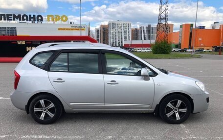 KIA Carens III (RP), 2011 год, 880 000 рублей, 9 фотография