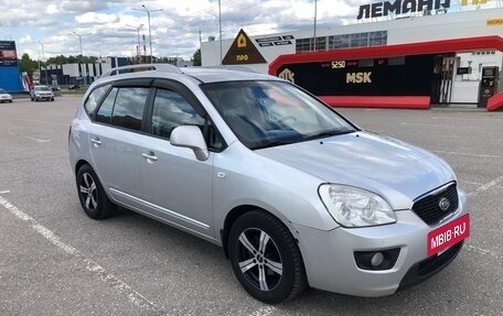 KIA Carens III (RP), 2011 год, 880 000 рублей, 8 фотография