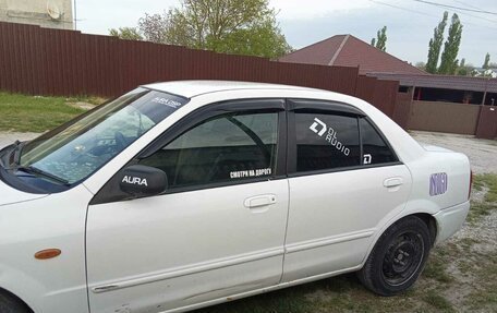 Mazda Familia, 2001 год, 280 000 рублей, 4 фотография