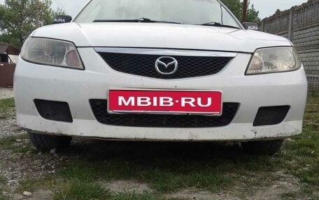 Mazda Familia, 2001 год, 280 000 рублей, 12 фотография