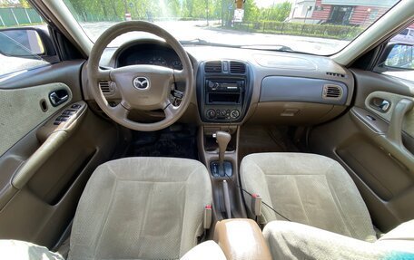 Mazda 323, 1999 год, 199 000 рублей, 7 фотография