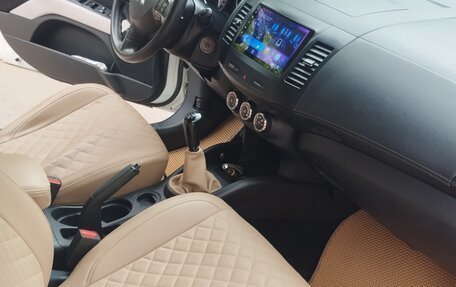 Mitsubishi Outlander III рестайлинг 3, 2011 год, 1 340 000 рублей, 12 фотография
