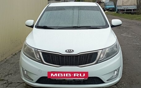 KIA Rio III рестайлинг, 2011 год, 690 000 рублей, 3 фотография