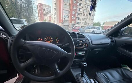 Mitsubishi Mirage VI рестайлинг, 2000 год, 200 000 рублей, 10 фотография