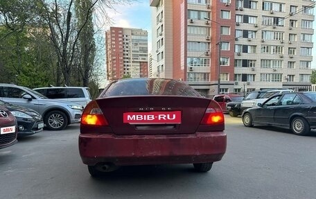 Mitsubishi Mirage VI рестайлинг, 2000 год, 200 000 рублей, 5 фотография