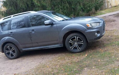 Mitsubishi Outlander III рестайлинг 3, 2010 год, 750 000 рублей, 2 фотография